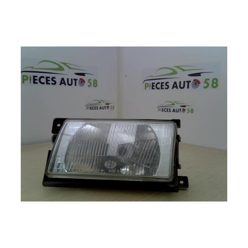 Optique avant principal gauche (feux)(phare) VOLKSWAGEN POLO COUPE PHASE 1 d’occasion